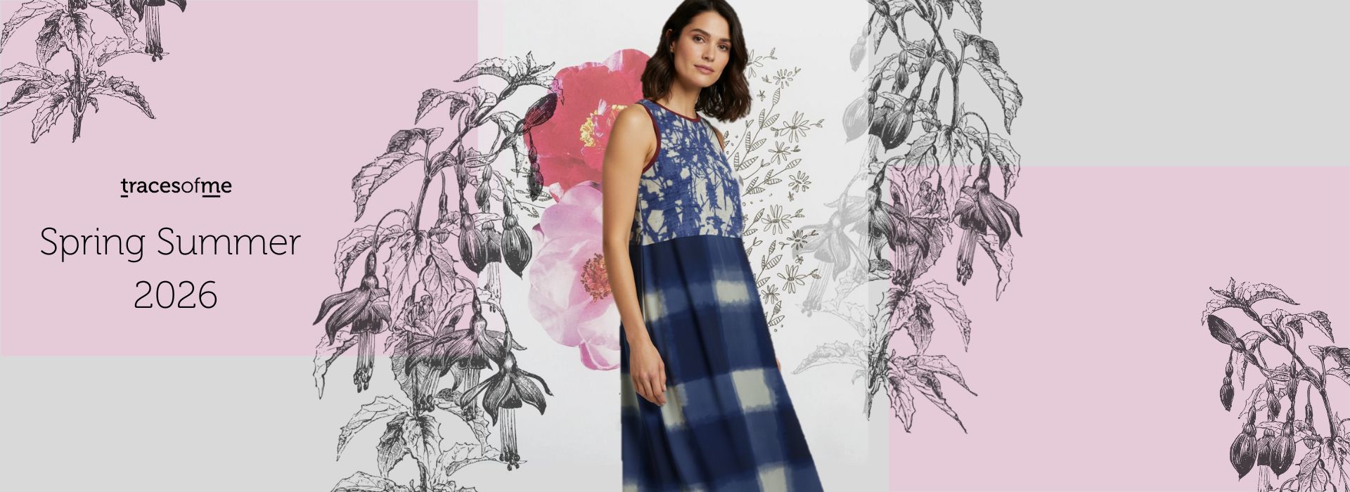 Woman wearing a blue floral top and plaid skirt with decorative elements and 'traceofme' branding.